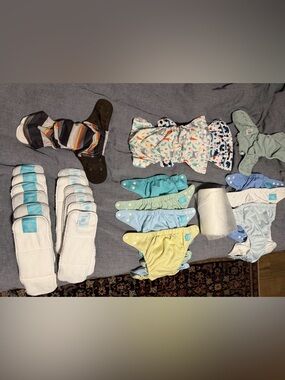 Charlie Banana Pastel Reusable cloth Diapers plus a few others. Total 11!